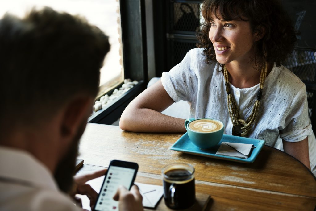 Two people conversing.